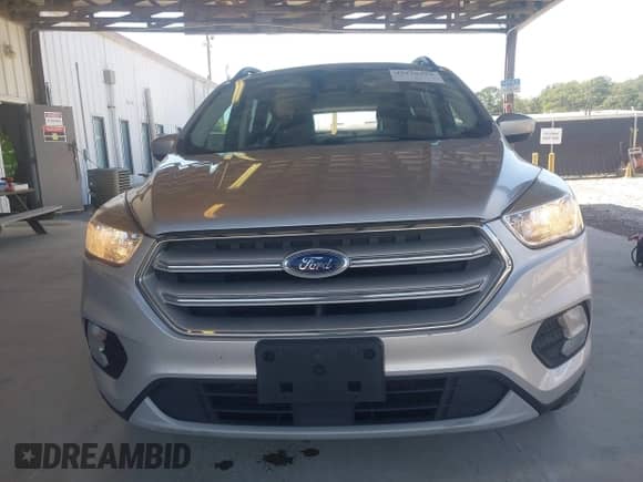 2018 Ford Escape SE with VIN 1FMCU9GDXJUC62452, listed as a IAAI auction lot 43119355 with 117,966 mi miles and . Bid and sale history available at DreamBid. Image 13.