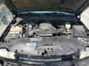 2003 Chevrolet Suburban Z71 z VIN 3GNFK16Z93G264731, wystawiony jako Copart lot #71243894 z przebiegiem Nie podano mil oraz Szkoda całkowita • Salvage title. Historia ofert i sprzedaży dostępna na DreamBid. Obrazek 12.