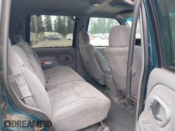 1997 Chevrolet Tahoe with VIN 1GNEK13R0VJ362743, listed as a IAAI auction lot 42594287 with 190,653 mi miles and . Bid and sale history available at DreamBid. Image 8.