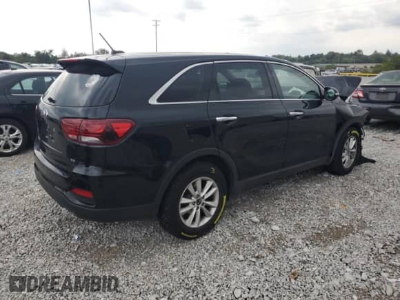 2020 Kia Sorento LX z VIN 5XYPG4A52LG622528, wystawiony jako Copart lot #81673125 z przebiegiem Nie podano mil oraz Szkoda całkowita • Salvage title. Historia ofert i sprzedaży dostępna na DreamBid. Obrazek 3.