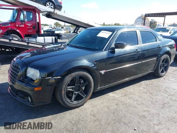 2006 Chrysler 300 C SRT-8 with VIN 2C3LA73W86H388896, listed as a IAAI auction lot 40599030 with 152,547 mi miles and . Bid and sale history available at DreamBid. Image 2.