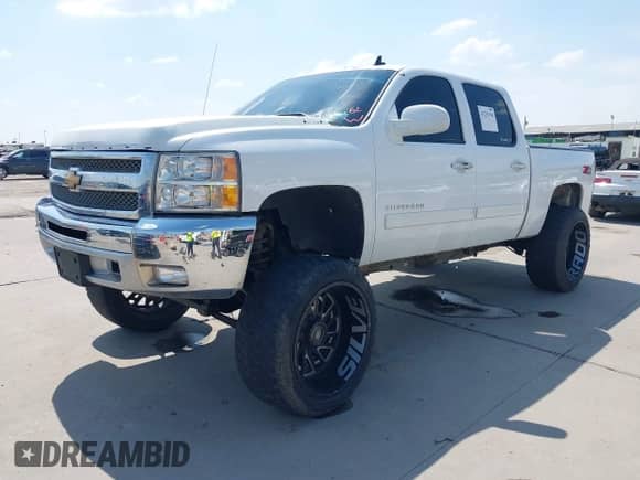 2012 Chevrolet Silverado 1500 LT с VIN 3GCPKSE70CG120326, выставлен на аукционе IAAI как лот 43235194 с пробегом 220 255 миль миль и . История ставок и продаж доступна на DreamBid. Изображение 17.