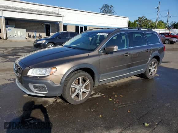 2013 Volvo XC70 T6 с VIN YV4902BZ4D1163553, выставлен на аукционе Copart как лот 69815045 с пробегом 136 462 миль миль и Списание • Salvage title. История ставок и продаж доступна на DreamBid. Изображение 1.