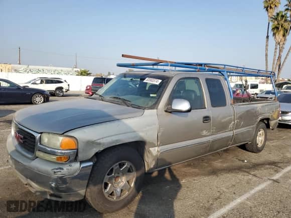 2002 GMC Sierra 1500 SLE с VIN 1GTEC19T32E124432, выставлен на аукционе Copart как лот 83583374 с пробегом Не указан миль и Списание • Salvage title. История ставок и продаж доступна на DreamBid. Изображение 1.