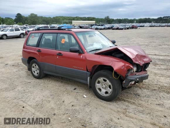 2002 Subaru Forester L with VIN JF1SF63592H742411, listed as a Copart auction lot 57969415 with Not provided miles and Salvage title. Bid and sale history available at DreamBid. Image 4.