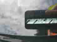 2023 Honda Pilot Touring z VIN 5FNYG1H78PB012799, wystawiony jako Copart lot #64933945 z przebiegiem 31 834 mil mil oraz Szkoda całkowita • Salvage title. Historia ofert i sprzedaży dostępna na DreamBid. Obrazek 13.