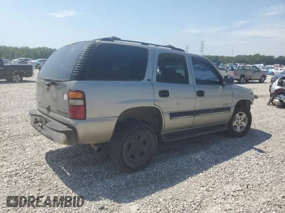 2001 Chevrolet Tahoe LS с VIN 1GNEC13TX1R162313, выставлен на аукционе Copart как лот 69262515 с пробегом 301 492 миль миль и Списание • Salvage title. История ставок и продаж доступна на DreamBid. Изображение 3.