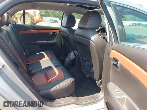 2012 Chevrolet Malibu LTZ z VIN 1G1ZG5E77CF182005, wystawiony jako IAAI lot #43173658 z przebiegiem 188 124 mil mil oraz . Historia ofert i sprzedaży dostępna na DreamBid. Obrazek 8.