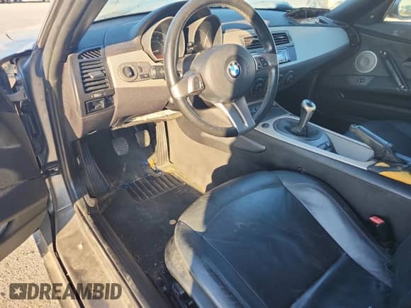 2004 BMW Z4 3.0i with VIN 4USBT53564LT25710, listed as a Copart auction lot 80996885 with 80,517 mi miles and Salvage title. Bid and sale history available at DreamBid. Image 8.