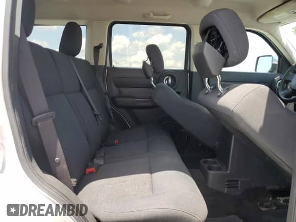 2011 Dodge Nitro Heat with VIN 1D4PT4GK5BW605204, listed as a Copart auction lot 52677235 with 104,039 mi miles and Salvage title. Bid and sale history available at DreamBid. Image 10.