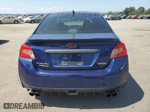 2016 Subaru WRX with VIN JF1VA1B61G9803812, listed as a Copart auction lot 68613805 with 63,864 mi miles and Salvage title. Bid and sale history available at DreamBid. Image 6.