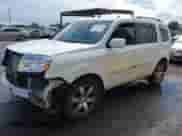 2013 Honda Pilot Touring with VIN 5FNYF4H95DB001891, listed as a IAAI auction lot 43335857 with 236,842 mi miles and . Bid and sale history available at DreamBid. Image 2.