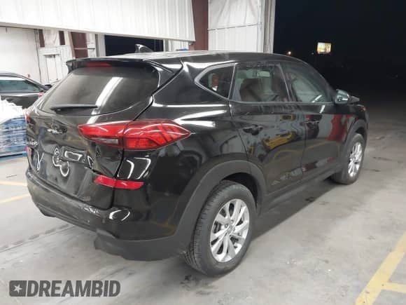 2019 Hyundai Tucson SE z VIN KM8J23A41KU857405, wystawiony jako IAAI lot #43237842 z przebiegiem 78 538 mil mil oraz . Historia ofert i sprzedaży dostępna na DreamBid. Obrazek 4.