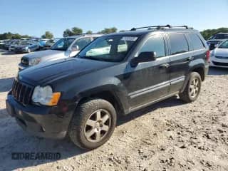 2009 Jeep Grand Cherokee Laredo with VIN 1J8GR48K69C545030, listed as a Copart auction lot 71201035 with 195,914 mi miles and Clean title. Bid and sale history available at DreamBid. Image 1.
