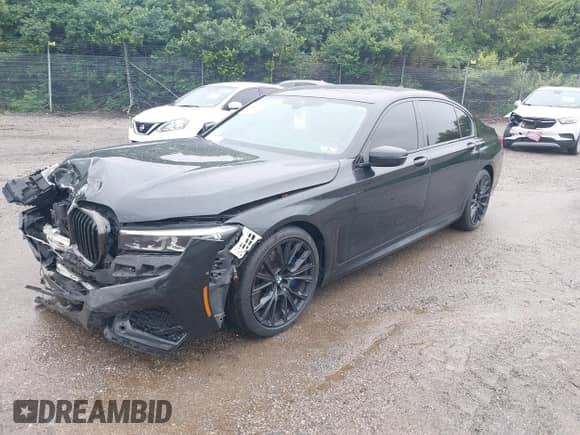 2021 BMW 7 Series 740i z VIN WBA7T2C0XMCF73506, wystawiony jako IAAI lot #42335145 z przebiegiem 35 838 mil mil oraz . Historia ofert i sprzedaży dostępna na DreamBid. Obrazek 2.