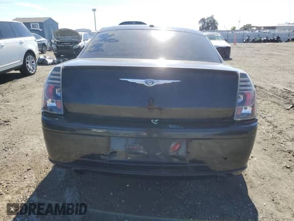 2007 Chrysler 300 C SRT-8 with VIN 2C3LA73W67H660170, listed as a Copart auction lot 87027115 with Not provided miles and Salvage title. Bid and sale history available at DreamBid. Image 6.