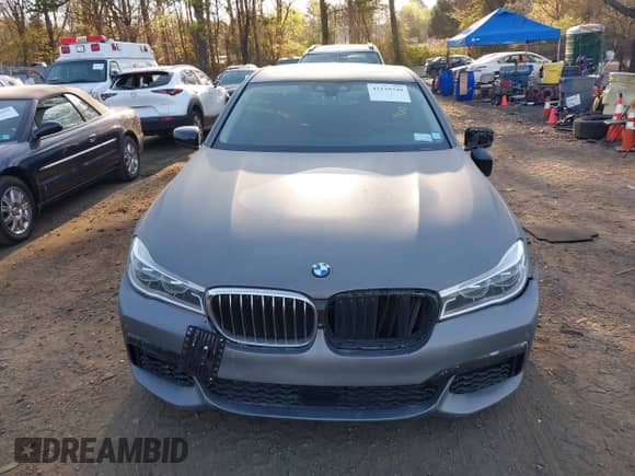 2016 BMW 7 Series 750i xDrive z VIN WBA7F2C53GG417885, wystawiony jako IAAI lot #42110749 z przebiegiem 94 133 mil mil oraz . Historia ofert i sprzedaży dostępna na DreamBid. Obrazek 12.