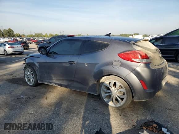 2013 Hyundai Veloster w/Black Int z VIN KMHTC6AD1DU130100, wystawiony jako Copart lot #83947425 z przebiegiem 155 402 mil mil oraz Szkoda całkowita • Salvage title. Historia ofert i sprzedaży dostępna na DreamBid. Obrazek 2.