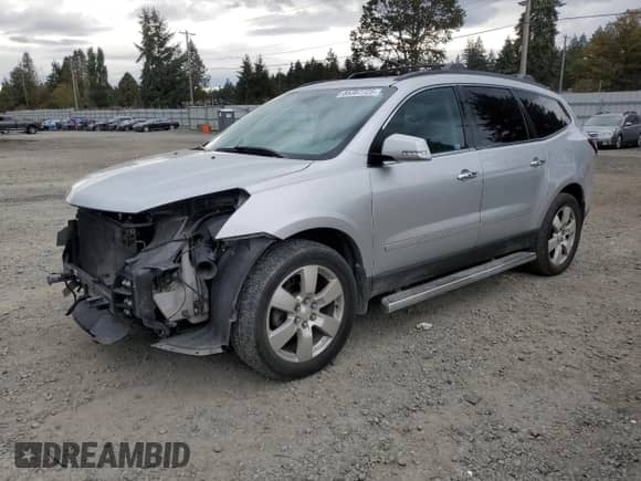 2013 Chevrolet Traverse LTZ с VIN 1GNKVLKD6DJ149578, выставлен на аукционе Copart как лот 85387725 с пробегом 109 176 миль миль и Списание • Salvage title. История ставок и продаж доступна на DreamBid. Изображение 1.