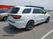 2018 Dodge Durango SRT with VIN 1C4SDJGJ2JC434843, listed as a IAAI auction lot 42434327 with 144,483 mi miles and . Bid and sale history available at DreamBid. Image 4.