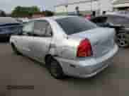 2005 Hyundai Accent GLS z VIN KMHCG45C45U631414, wystawiony jako Copart lot #73963814 z przebiegiem 106 617 mil mil oraz Szkoda całkowita • Salvage title. Historia ofert i sprzedaży dostępna na DreamBid. Obrazek 2.