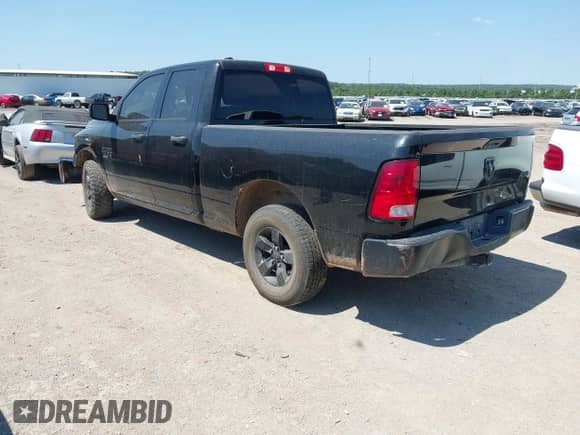 2021 Ram 1500 Express z VIN 1C6RR7FG6MS569401, wystawiony jako IAAI lot #43069535 z przebiegiem 119 087 mil mil oraz . Historia ofert i sprzedaży dostępna na DreamBid. Obrazek 3.