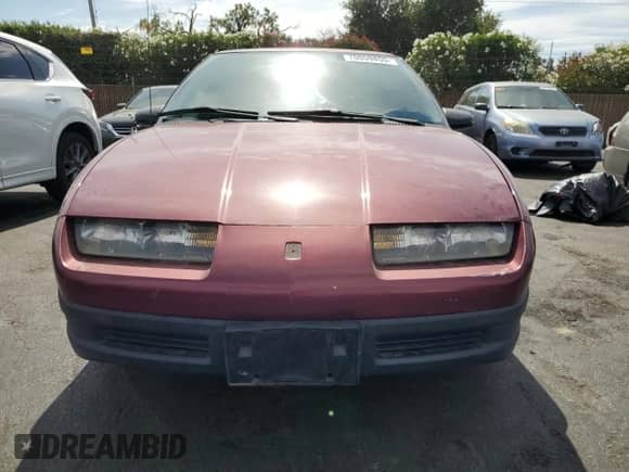 1995 Saturn SL with VIN 1G8ZH5286SZ149862, listed as a Copart auction lot 70059855 with 103,300 mi miles and Salvage title. Bid and sale history available at DreamBid. Image 5.
