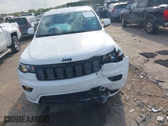 2021 Jeep Grand Cherokee Laredo E with VIN 1C4RJEAG5MC679877, listed as a IAAI auction lot 42367642 with 41,478 mi miles and . Bid and sale history available at DreamBid. Image 12.