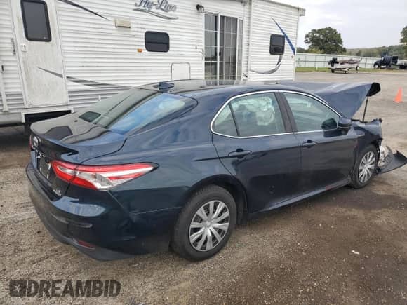 2019 Toyota Camry Hybrid LE с VIN 4T1B31HK1KU509422, выставлен на аукционе Copart как лот 86729355 с пробегом 63 027 миль миль и Списание • Salvage title. История ставок и продаж доступна на DreamBid. Изображение 3.