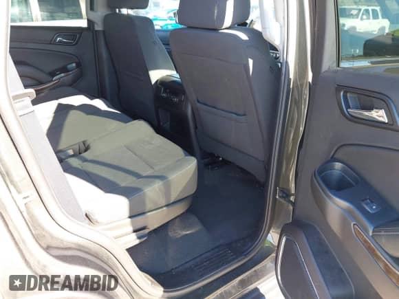 2019 Chevrolet Tahoe LS with VIN 1GNSKAKC4KR226743, listed as a IAAI auction lot 40839068 with 104,220 mi miles and . Bid and sale history available at DreamBid. Image 8.