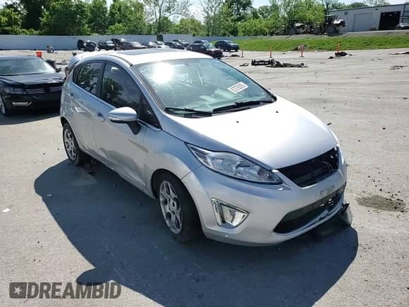 2011 Ford Fiesta SES with VIN 3FADP4FJ5BM200284, listed as a Copart auction lot 57276395 with 161,849 mi miles and Salvage title. Bid and sale history available at DreamBid. Image 13.