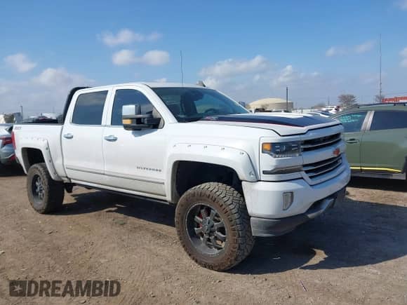 2017 Chevrolet Silverado 1500 LTZ z VIN 3GCUKSEJ9HG150558, wystawiony jako IAAI lot #41514409 z przebiegiem 107 969 mil mil oraz . Historia ofert i sprzedaży dostępna na DreamBid. Obrazek 13.