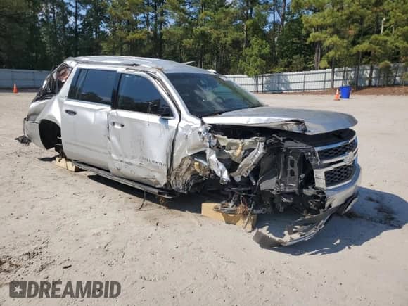 2018 Chevrolet Suburban LT with VIN 1GNSCHKC9JR237158, listed as a Copart auction lot 83975075 with 142,981 mi miles and Salvage title. Bid and sale history available at DreamBid. Image 4.