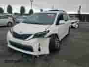 2015 Toyota Sienna SE with VIN 5TDXK3DC4FS663754, listed as a Copart auction lot 65745835 with 100,446 mi miles and Salvage title. Bid and sale history available at DreamBid. Image 14.