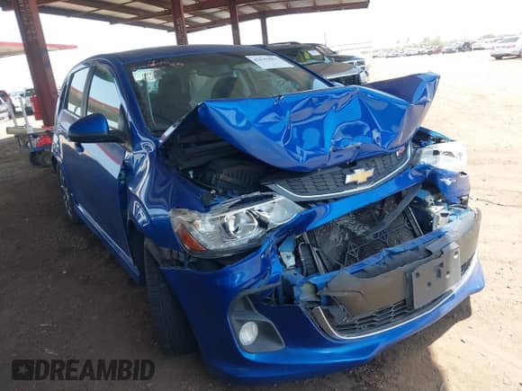 2017 Chevrolet Sonic LT z VIN 1G1JD6SH5H4136572, wystawiony jako IAAI lot #42643061 z przebiegiem 159 953 mil mil oraz . Historia ofert i sprzedaży dostępna na DreamBid. Obrazek 1.