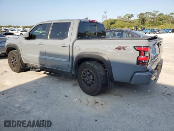 2022 Nissan Frontier Pro-4X z VIN 1N6ED1EK5NN692886, wystawiony jako Copart lot #48501315 z przebiegiem 20 895 mil mil oraz Szkoda całkowita • Salvage title. Historia ofert i sprzedaży dostępna na DreamBid. Obrazek 2.