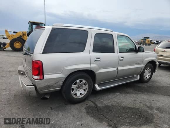 2004 Cadillac Escalade with VIN 1GYEC63T64R285823, listed as a Copart auction lot 59167915 with 289,955 mi miles and Salvage title. Bid and sale history available at DreamBid. Image 3.
