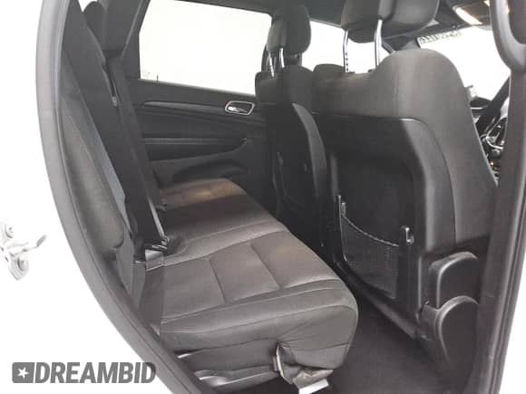2020 Jeep Grand Cherokee Laredo E z VIN 1C4RJFAG4LC196482, wystawiony jako Copart lot #84601225 z przebiegiem 129 525 mil mil oraz Czysty tytuł • Clean title. Historia ofert i sprzedaży dostępna na DreamBid. Obrazek 10.