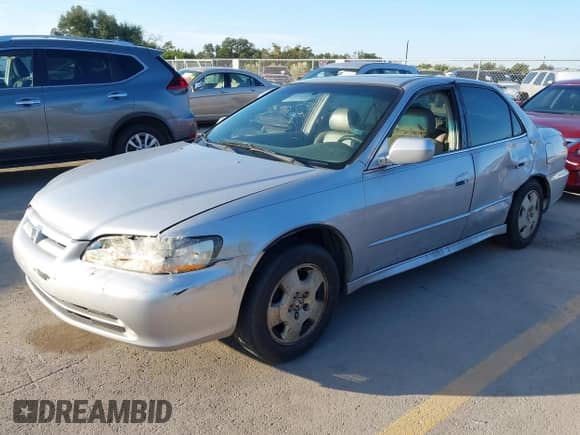 2002 Honda Accord EX with VIN 1HGCG16532A001692, listed as a IAAI auction lot 43408519 with 313,872 mi miles and . Bid and sale history available at DreamBid. Image 2.