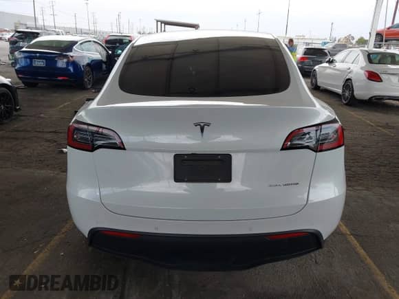 2022 Tesla Model Y Long Range z VIN 7SAYGDEE6NF345426, wystawiony jako IAAI lot #43121529 z przebiegiem 49 441 mil mil oraz . Historia ofert i sprzedaży dostępna na DreamBid. Obrazek 16.