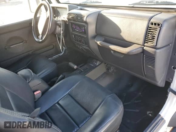 1999 Jeep Wrangler Sport with VIN 1J4FY19SXXP412760, listed as a Copart auction lot 84983895 with 180,172 mi miles and Clean title. Bid and sale history available at DreamBid. Image 8.