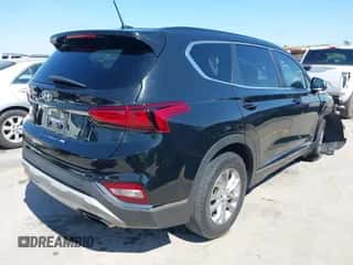 2019 Hyundai Santa Fe SE z VIN 5NMS23AD9KH136183, wystawiony jako IAAI lot #43399476 z przebiegiem 128 859 mil mil oraz . Historia ofert i sprzedaży dostępna na DreamBid. Obrazek 4.
