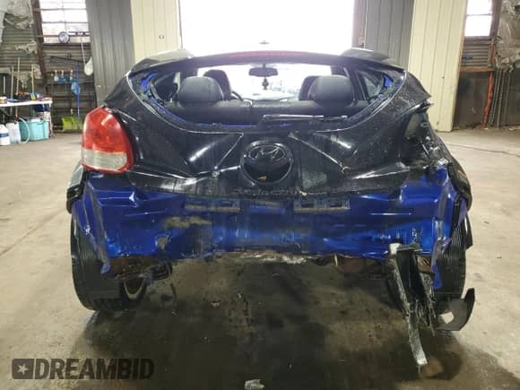 2012 Hyundai Veloster w/Black Int z VIN KMHTC6AD5CU020715, wystawiony jako Copart lot #87423735 z przebiegiem 137 931 mil mil oraz Szkoda całkowita • Salvage title. Historia ofert i sprzedaży dostępna na DreamBid. Obrazek 6.