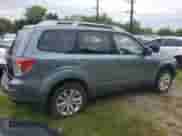 2013 Subaru Forester X Touring z VIN JF2SHAHC2DH427856, wystawiony jako Copart lot #80940655 z przebiegiem 122 842 mil mil oraz Czysty tytuł • Clean title. Historia ofert i sprzedaży dostępna na DreamBid. Obrazek 4.