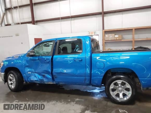 2021 Ram 1500 Big Horn with VIN 1C6SRFFT7MN694639, listed as a IAAI auction lot 43253486 with 77,360 mi miles and . Bid and sale history available at DreamBid. Image 14.