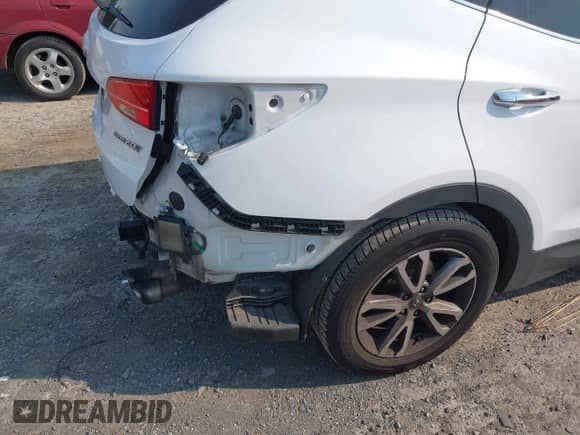 2014 Hyundai Santa Fe z VIN 5XYZU3LA3EG126890, wystawiony jako IAAI lot #42974858 z przebiegiem 103 129 mil mil oraz . Historia ofert i sprzedaży dostępna na DreamBid. Obrazek 19.