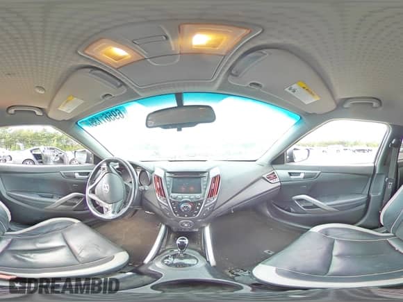 2013 Hyundai Veloster Turbo с VIN KMHTC6AE4DU171846, выставлен на аукционе Copart как лот 69561135 с пробегом Не указан миль и На запчасти • Non repairable. История ставок и продаж доступна на DreamBid. Изображение 14.