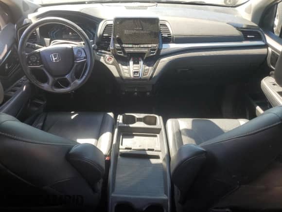 2021 Honda Odyssey Touring с VIN 5FNRL6H85MB013894, выставлен на аукционе Copart как лот 71153575 с пробегом 60 452 миль миль и Списание • Salvage title. История ставок и продаж доступна на DreamBid. Изображение 8.