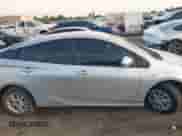 2021 Toyota Prius L Eco with VIN JTDKAMFUXM3143243, listed as a IAAI auction lot 43079577 with 87,002 mi miles and . Bid and sale history available at DreamBid. Image 12.