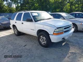 2003 Chevrolet Blazer LS with VIN 1GNDT13X53K179630, listed as a IAAI auction lot 42750650 with 214,387 mi miles and . Bid and sale history available at DreamBid. Image 1.